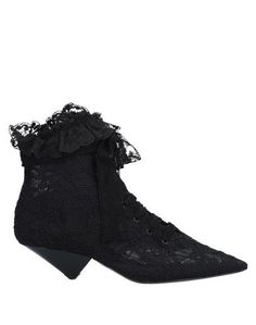Полусапоги и высокие ботинки Saint Laurent