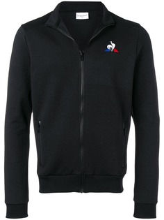 Одежда Le Coq Sportif