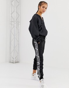 Черные джоггеры с отделкой кантом Puma - Черный