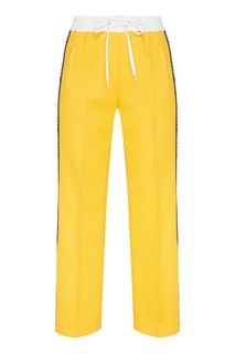 Желтые брюки с лампасами Miu Miu