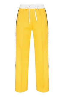 Желтые брюки с лампасами Miu Miu
