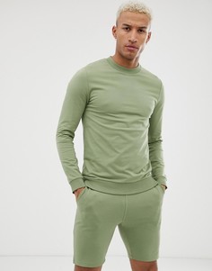Зеленый спортивный костюм из свитшота и шортов скинни ASOS DESIGN - Зеленый