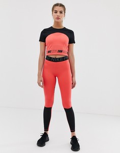 Розовые леггинсы колор блок Nike Training - Розовый