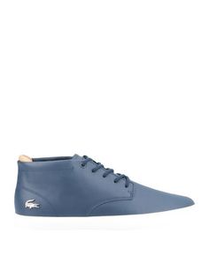 Низкие кеды и кроссовки Lacoste