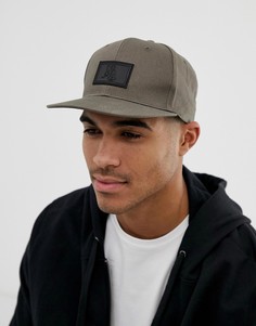 Бейсболка цвета хаки с резиновой нашивкой ASOS DESIGN - Зеленый