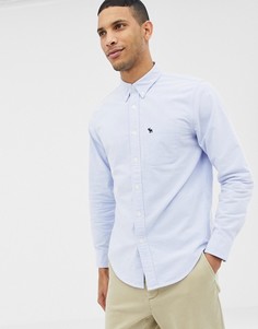Светло-синяя оксфордская рубашка на пуговицах с логотипом на кармане Abercrombie & Fitch - Синий