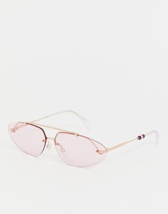 Розовые овальные солнцезащитные очки Tommy Hilfiger - Розовый