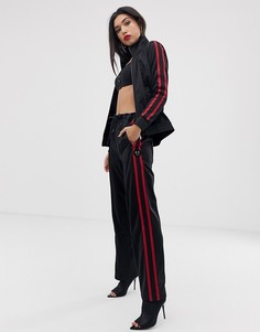 Спортивные брюки с логотипом и полосками по бокам Armani Exchange - Черный