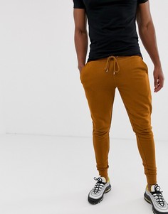 Темно-оранжевые зауженные джоггеры ASOS DESIGN - Оранжевый