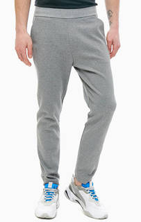 Зауженные хлопковые брюки серого цвета Armani Exchange