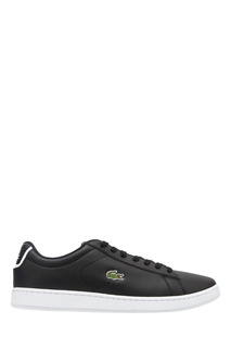 Черные кеды с белой подошвой Lacoste