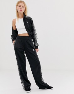Спортивные брюки с тремя полосками adidas Originals - Черный