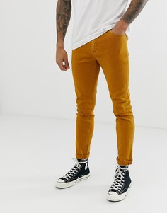 Джинсы скинни горчичного цвета ASOS DESIGN - Рыжий