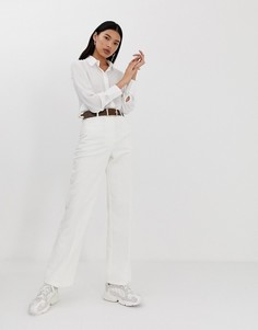 Вельветовые расклешенные брюки кремового цвета ASOS DESIGN - Кремовый