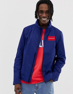 Куртка из технической ткани с капюшоном и логотипом Calvin Klein Jeans - Синий