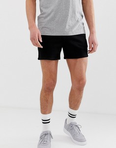 Черные джинсовые шорты скинни ASOS DESIGN - Черный