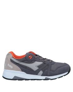 Низкие кеды и кроссовки Diadora
