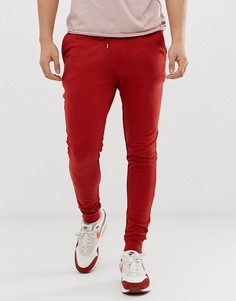Ярко-красные зауженные джоггеры ASOS DESIGN - Красный