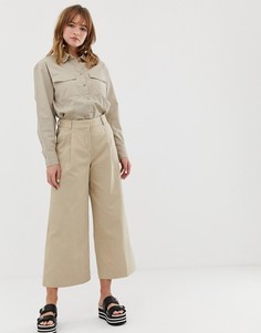 Бежевые брюки с широкими укороченными штанинами Monki - Бежевый