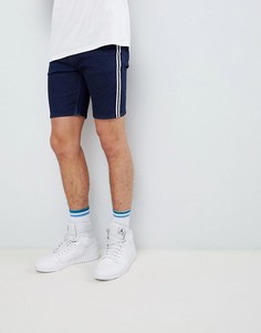 Джинсовые шорты скинни цвета индиго с полосками ASOS DESIGN - Синий