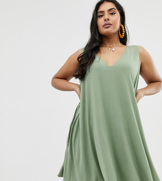 Эксклюзивное свободное платье со скрытыми карманами ASOS DESIGN Curve - Зеленый
