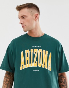 Зеленая oversize-футболка с принтом и отворотами на рукавах ASOS DESIGN - Зеленый