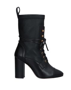 Полусапоги и высокие ботинки Stuart Weitzman