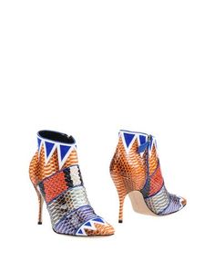 Полусапоги и высокие ботинки Manolo Blahnik