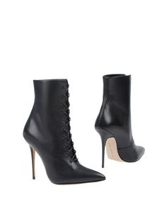 Полусапоги и высокие ботинки Manolo Blahnik