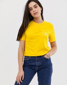 Короткая футболка с карманом Calvin Klein Jeans - Желтый