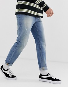 Выбеленные синие суженные книзу джинсы с потертостями ASOS DESIGN - Синий