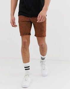 Джинсовые шорты скинни с эффектом кислотной стирки ASOS DESIGN - Оранжевый