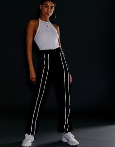 Расклешенные брюки со светоотражающими вставками ASOS DESIGN - Черный