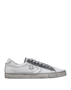 Низкие кеды и кроссовки Converse Limited Edition