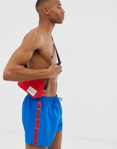 Синие шорты для плавания с фирменной лентой Calvin Klein - Синий