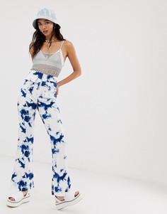 Расклешенные брюки с принтом тай-дай ASOS DESIGN - Мульти