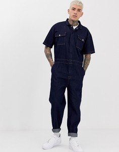 Джинсовый комбинезон цвета индиго ASOS DESIGN - Синий