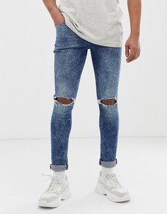 Синие джинсы скинни с эффектом кислотной стирки и рваными коленями ASOS DESIGN - Синий