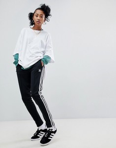 Черные брюки-сигареты с тремя полосками adidas Originals adicolor - Черный