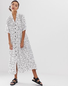 Черное платье-рубашка миди в горошек с карманами Monki - Белый