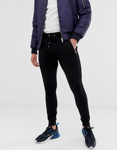 Черные супероблегающие джоггеры с золотистыми молниями ASOS DESIGN - Черный