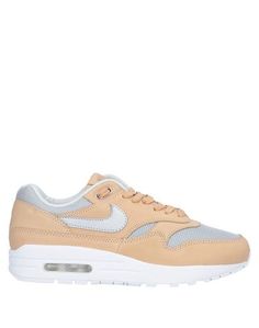 Низкие кеды и кроссовки Nike