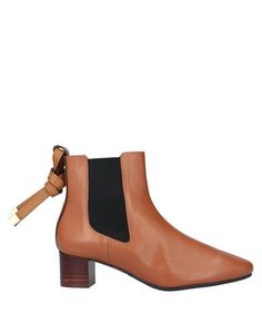 Полусапоги и высокие ботинки Stuart Weitzman