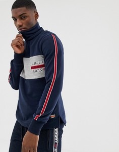 Темно-синий трикотажный топ хенли в стиле колор блок с аппликацией и молнией Superdry - Темно-синий