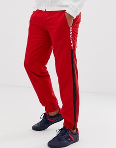 Джоггеры с полосками по бокам Lacoste - Мульти