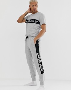Серые джоггеры с манжетами и логотипом Calvin Klein Statement 1981 - Серый
