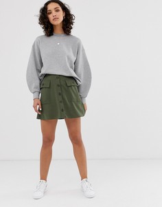 Мини-юбка на пуговицах с карманами в стиле милитари ASOS DESIGN - Зеленый