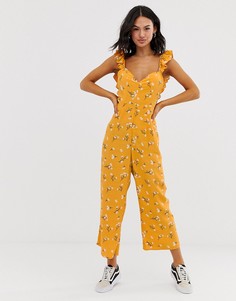Комбинезон с кюлотами, ремешками, оборками и цветочным принтом ASOS DESIGN - Желтый