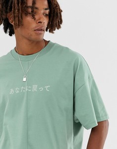 Oversize-футболка из плотной трикотажной ткани с принтом на груди и швом по центру ASOS DESIGN - Зеленый