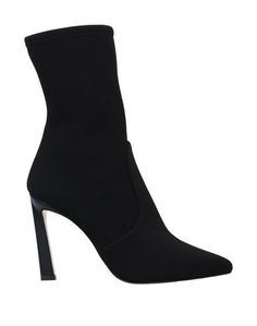 Полусапоги и высокие ботинки Stuart Weitzman